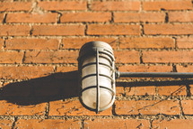 lamp on a brick wall 