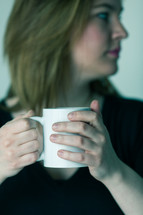 woman holding a mug
