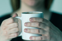 woman holding a mug
