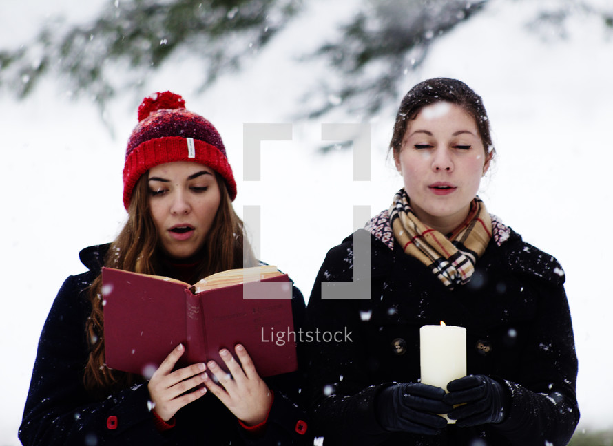 Christmas caroling in the snow 