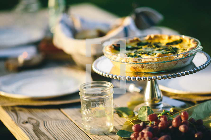 spinach quiche and place settings 