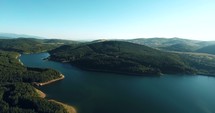 drone flying over a lake 
