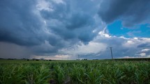 Timelapse of a thunderstorm rolling in over rural farmland.  