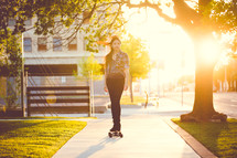 a young woman on a skateboard 
