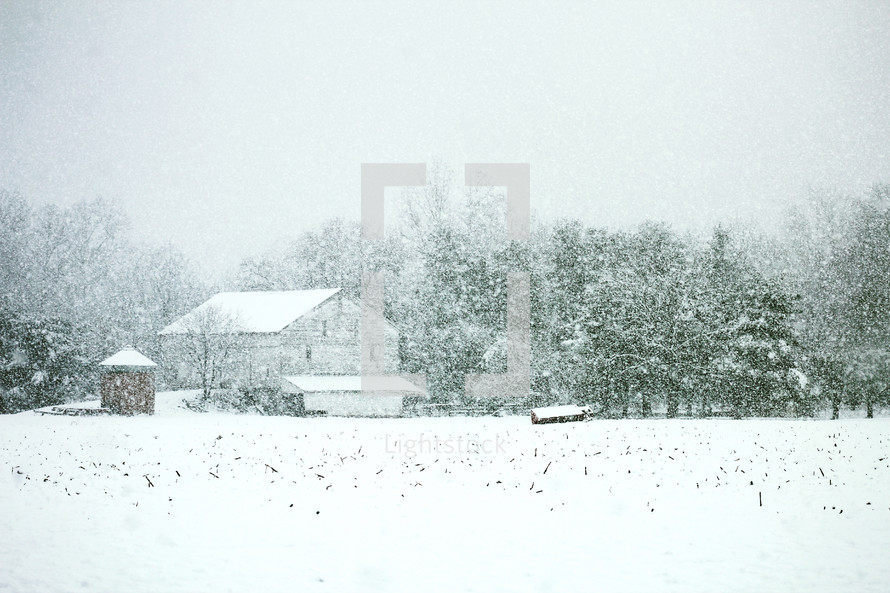 snow and a barn 
