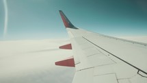 wing of a plane in flight 