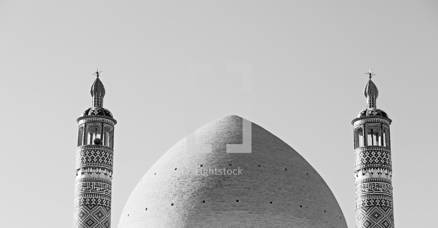 mosque dome and call to prayer towers