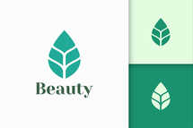 Beauty or Health Logo in Simple Leaf Shape Represent Nature