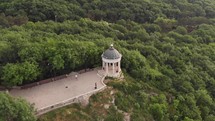 aerial view over gazebo lookout on a mountainside 