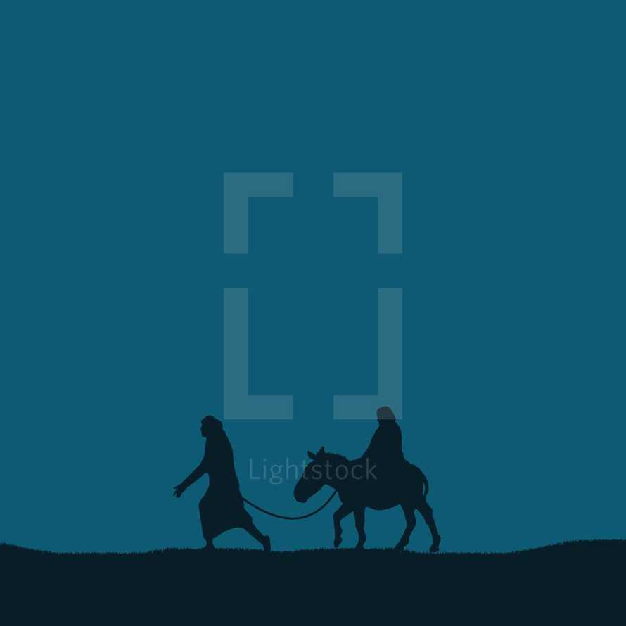 silhouette of Joseph and Mary on a donkey.