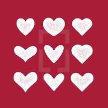 white hearts on red background 