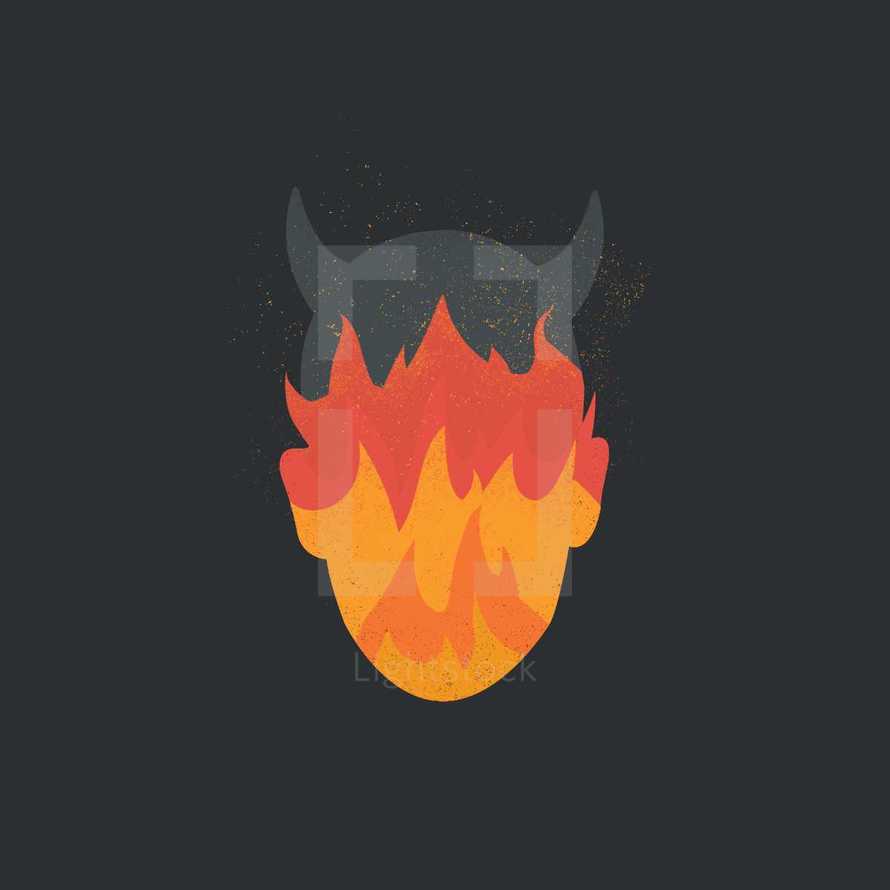devil head silhouette with fiery flames.  