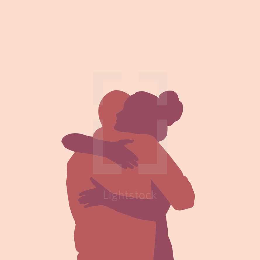 silhouette of couple hugging.