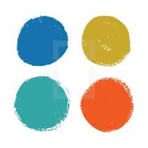 Four painted circles on a white background.