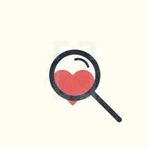 magnifying glass and heart 