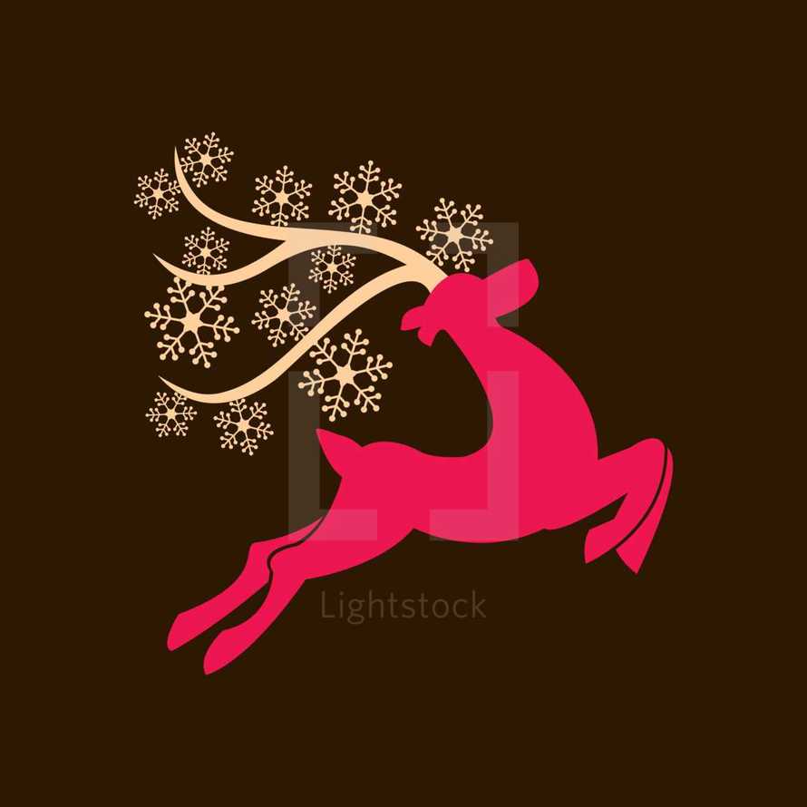 Christmas deer with snowflakes 