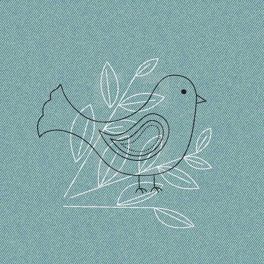 a bird in leaves on denim 