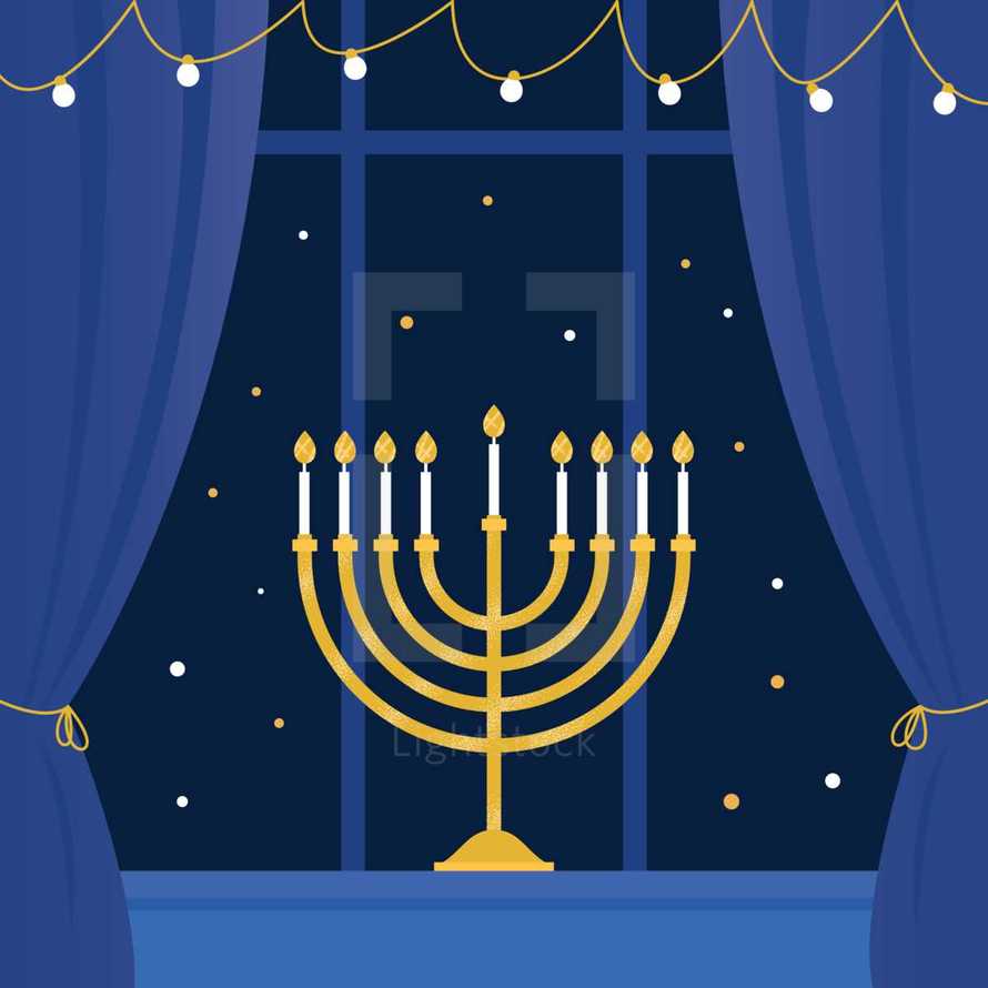 Lit Hanukkah Menorah in Window