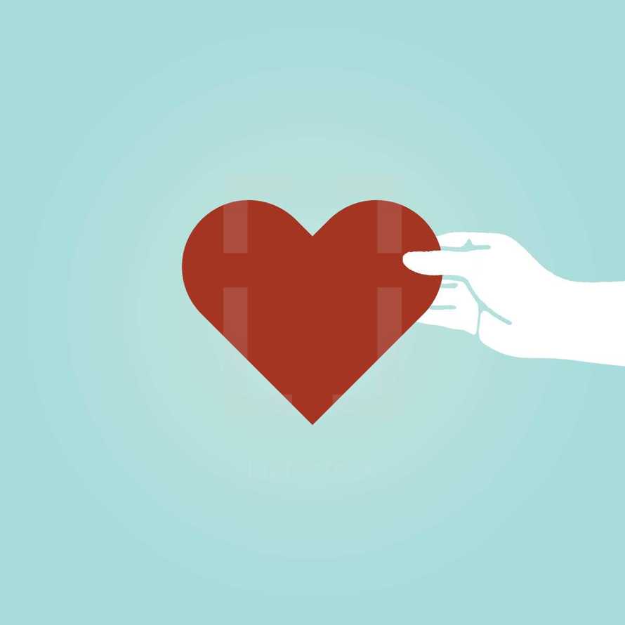 A hand holding a red heart on a blue background.