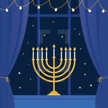 Lit Hanukkah Menorah in Window