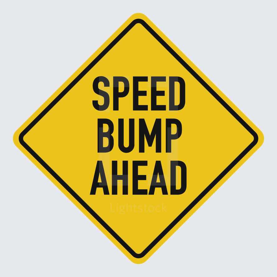 speed bump ahead sign