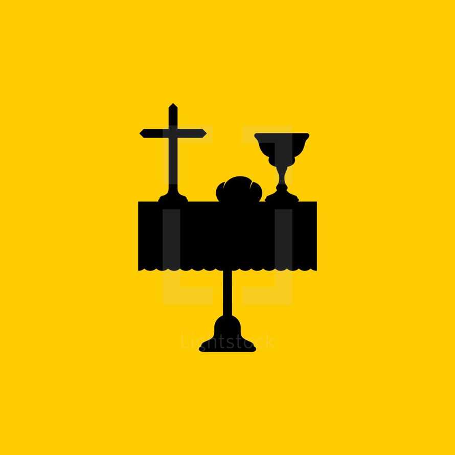 Christian symbols. A table with biblical symbols of the commandment of the sacrament - a cup of wine, bread and the cross of Jesus Christ.
