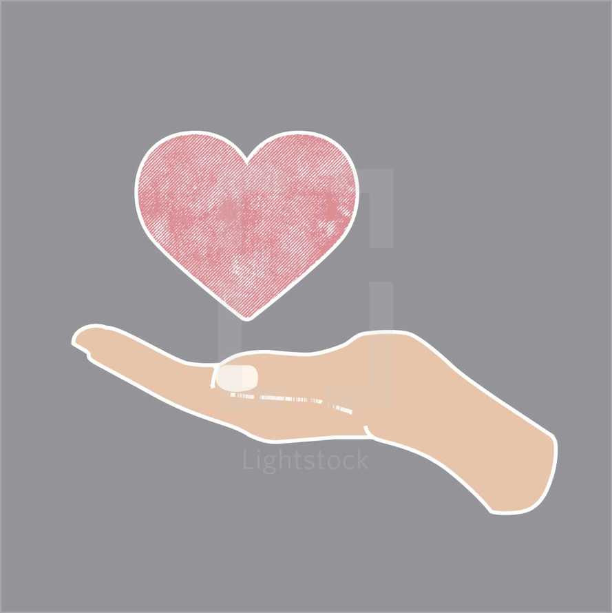 cupped hand holding a heart