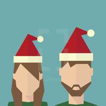 man and woman in Santa hats 