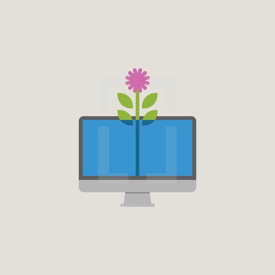 Flower growing out of a computer screen. 