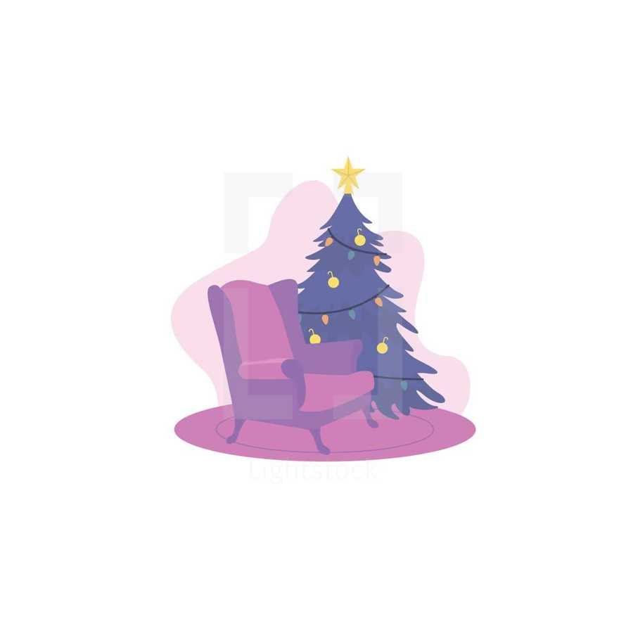 Christmas tree by a sitting chair 